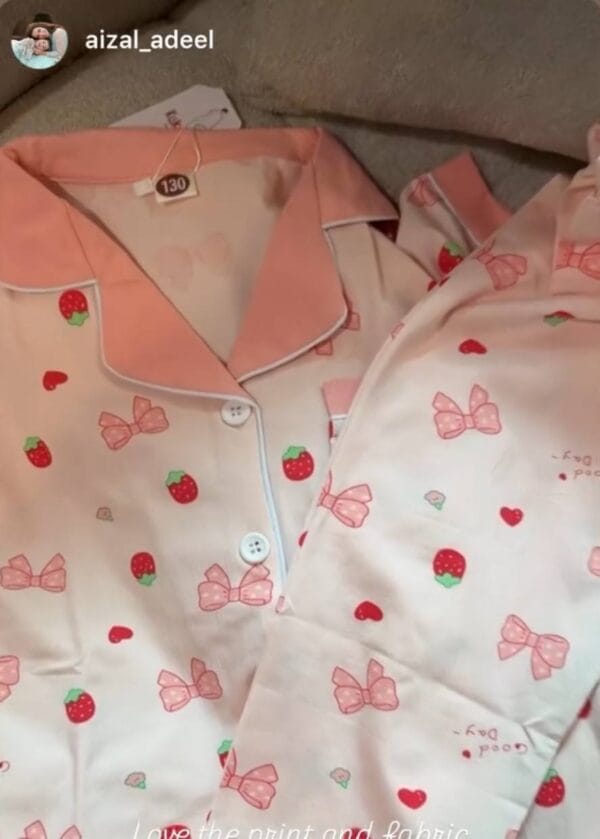Instagram story by aizal_adeel showing pink strawberry and bow print nightwear: love the print and the fabric